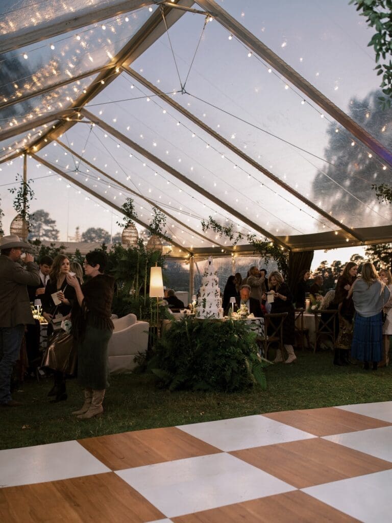 Beautiful Texas wedding venue with twinkle lights and clear tent.