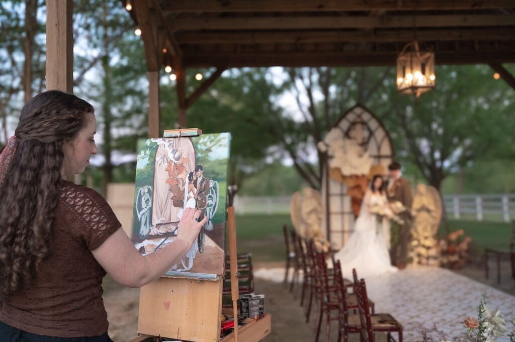 Texas wedding painting artist working behind the scenes.
