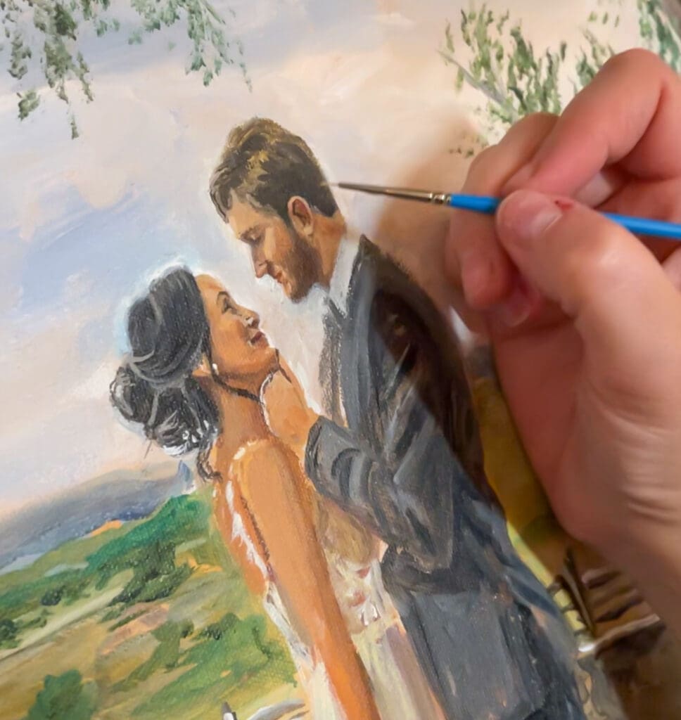 up close photo of the finishing details on  live wedding painting  by artist Laura Herndon - texas hill country wedding venue - texasweddingpainting.com